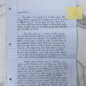 A handwritten letter on lined paper discussing social change, featuring a yellow sticky note with the number 2.