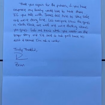 Handwritten letter on blue paper from Brian, mentioning James and North Block.