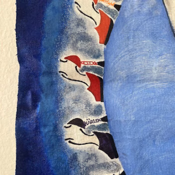 A blue and white fabric featuring stylized red and black bird silhouettes with the names 'SARAH', 'KARLENE', and 'JESS' printed on them.