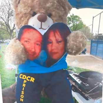 Shane Goddard A teddy bear wearing a blue shirt with a portrait of Shane Goddard and a woman, with 'CDCR PRISON' printed on the front.