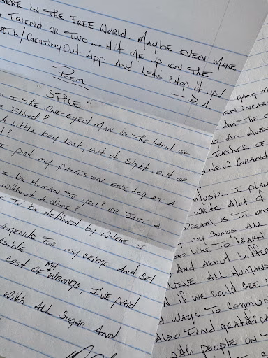 Handwritten poetry on lined paper, featuring the title "SPACE" and a poem about finding connection in the free world.