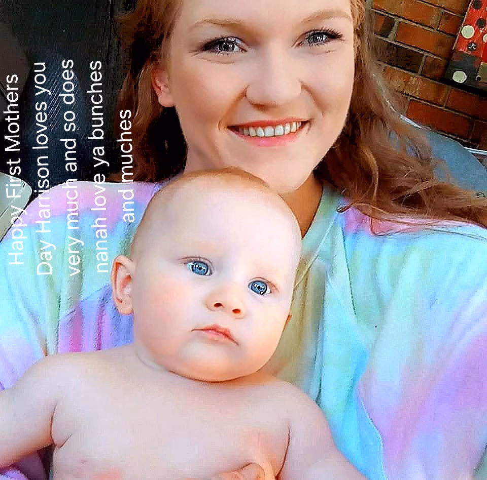 A smiling woman with long hair holds a baby with blue eyes. Text on the left reads: Happy First Mothers Day Harrison loves you very much and so does nanah love ya bunches and muches.