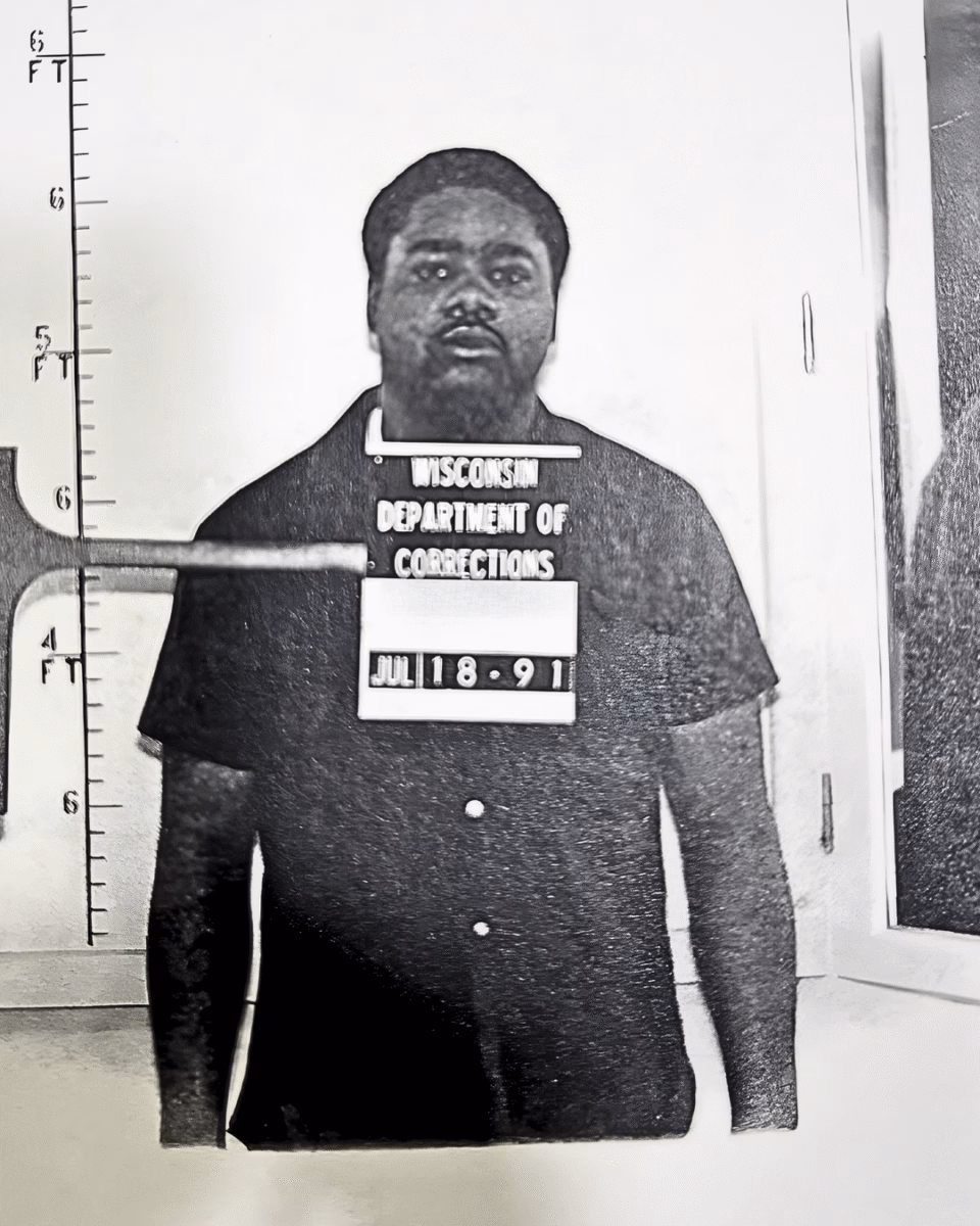 2 Mugshot of Charles, 56, from the Wisconsin Department of Corrections, dated July 18, 1991, standing in front of a height chart.