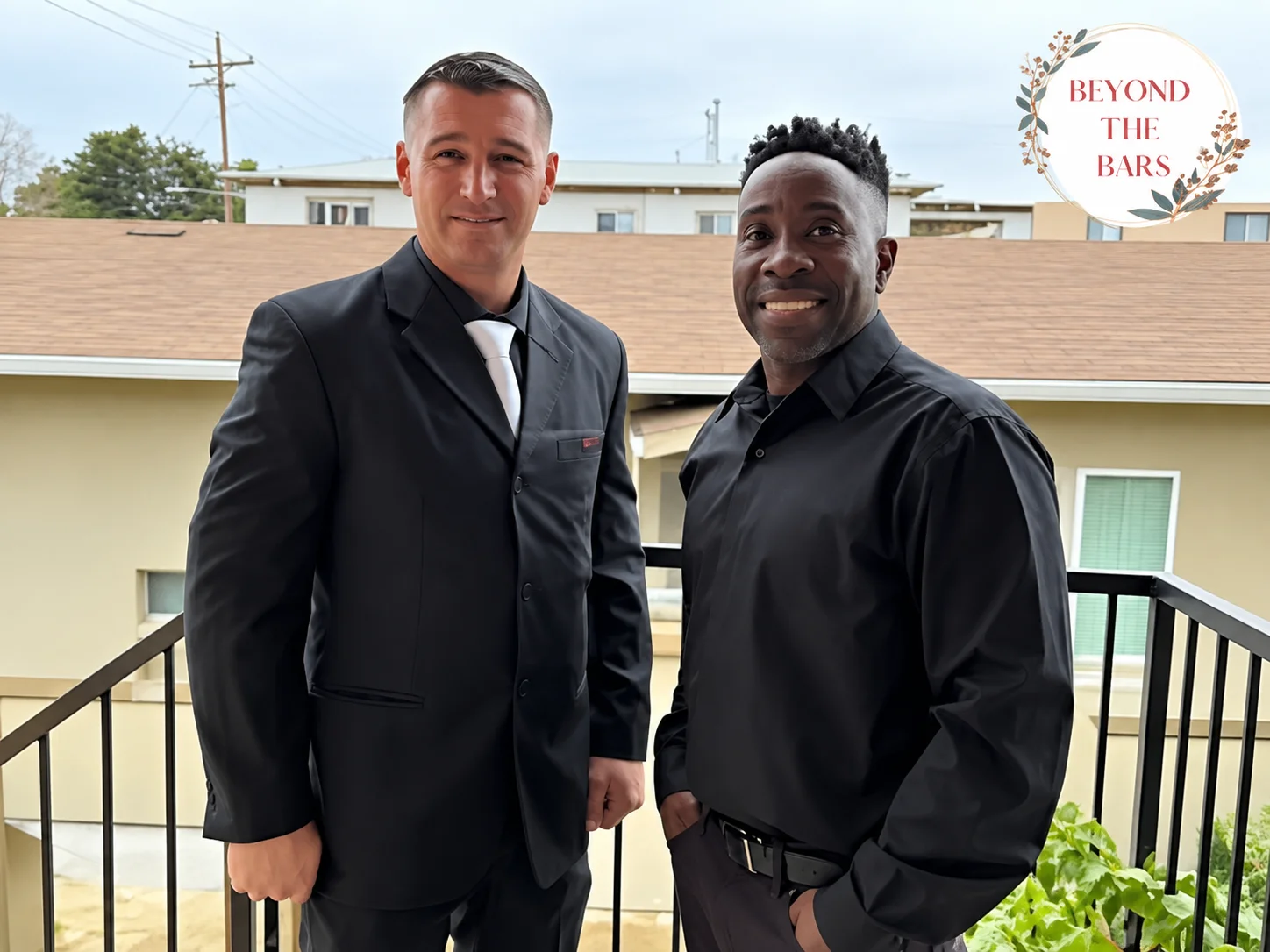 Two men, Ray Williams Jr. and a companion, stand together on a balcony. A logo for 'Beyond the Bars' is in the top right, and text at the bottom reads 'Ray Williams Jr. Released after 23 years'.