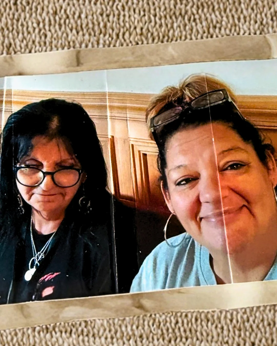 Photograph of Estefana smiling beside her mother, capturing a cherished family memory shared in her story about incarceration, separation, and hope.